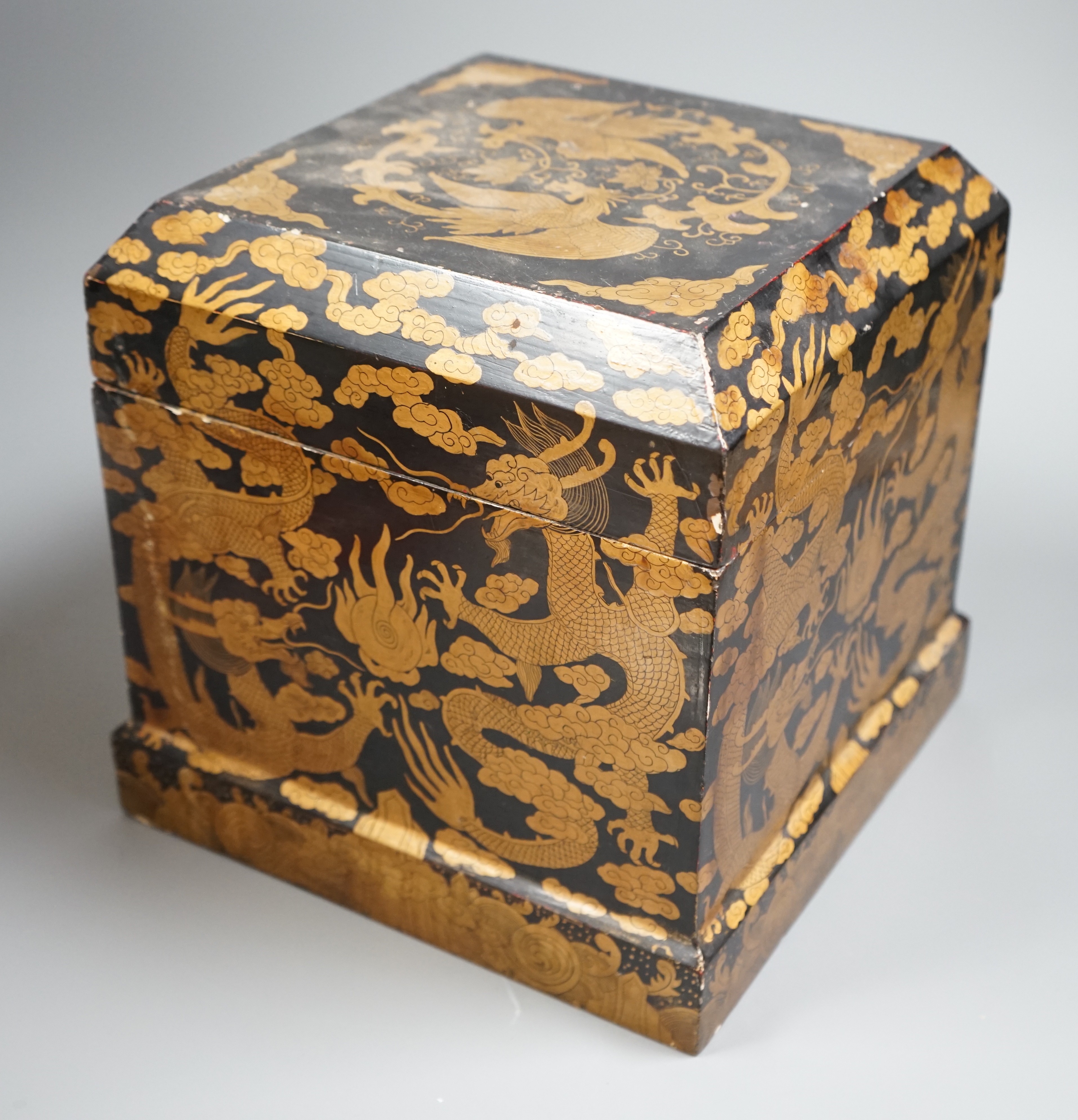 A Chinese black and gold lacquer ‘dragon’ box, early 20th century, 26.5 cms x 26.5 cms